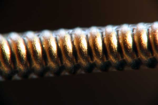 Coated guitar string closeup