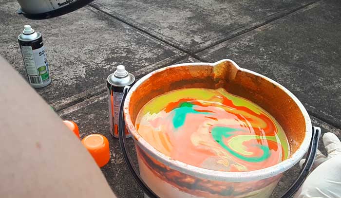 Tapping hydro dip paint