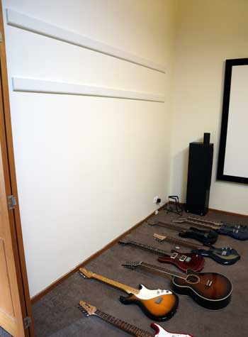 Guitar mounting boards on wall